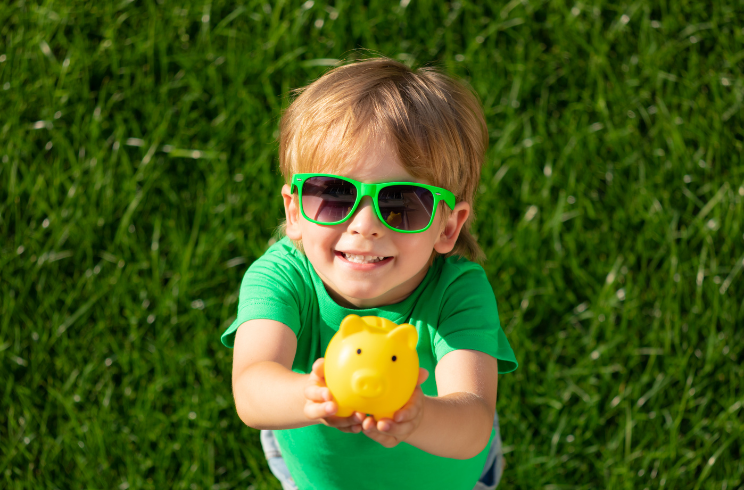 child with piggy bank